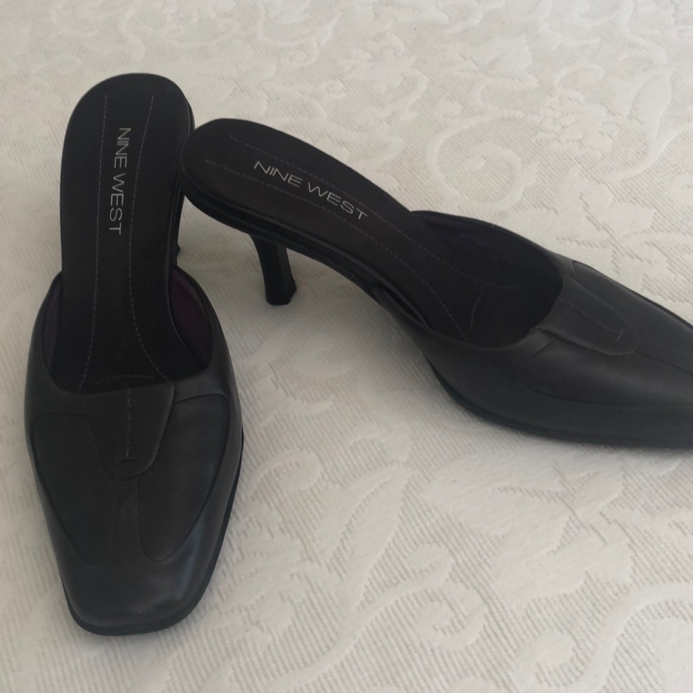 Dark brown leather slip on shoes from None West.  Rubber sole. 1 1/2 inch heel.
